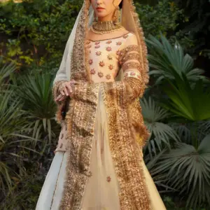 CoutureCraze blush pink gold embroidered lehenga set with star motifs and heavy threadwork