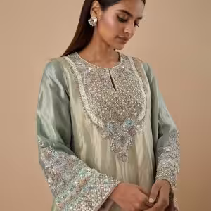 Mint green embroidered kurta with pastel beads and detailed sleeves from CoutureCraze