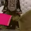 Olive green velvet suit with hand embroidered French velvet shirt, raw silk trousers and organza dupatta