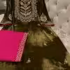 Olive green velvet suit with hand embroidered French velvet shirt, raw silk trousers and organza dupatta