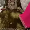 Hand embroidered sleeve detail on olive green velvet suit with resham and zari work
