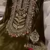 Olive green velvet suit with hand embroidered French velvet shirt, raw silk trousers and organza dupatta