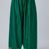 Green chiniya silk applique embroidered kurta styled for Indian wedding