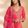 Detail of design on strawberry red spun silk kurta
